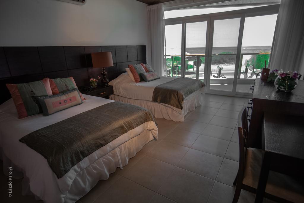 Iguana Crossing Boutique Hotel Puerto Villamil Dış mekan fotoğraf