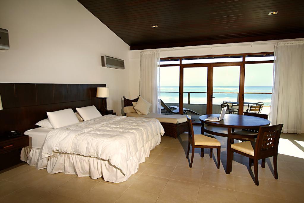 Iguana Crossing Boutique Hotel Puerto Villamil Oda fotoğraf